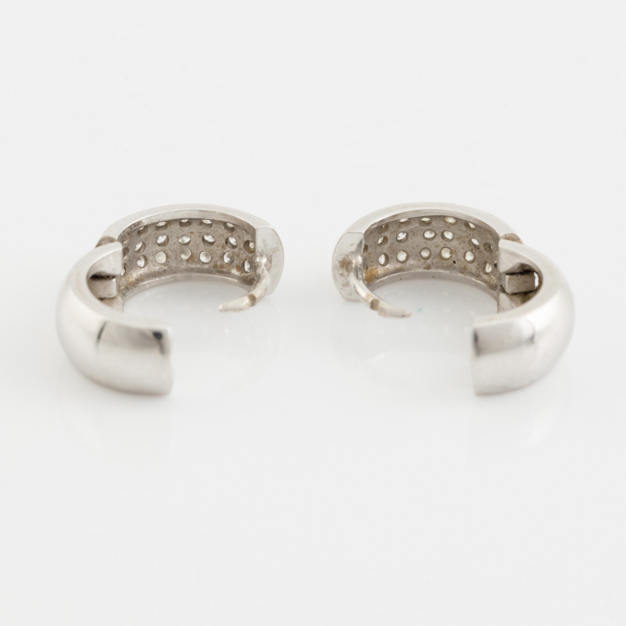 A pair of 18K white gold earrings with diamonds ca. 0.60 ct in total. Finnish import marks 1998.