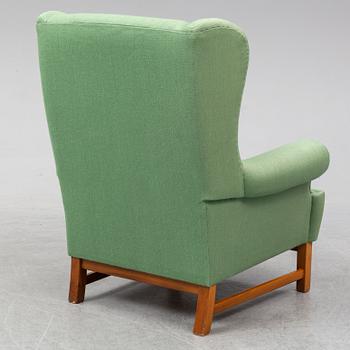 An 'Oxford' easy chair for Firma Svenskt Tenn.
