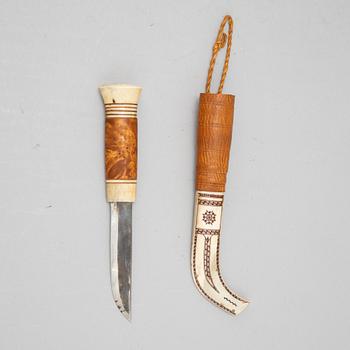 Esse Poggats, a rendeer horn Sami knife, signed.