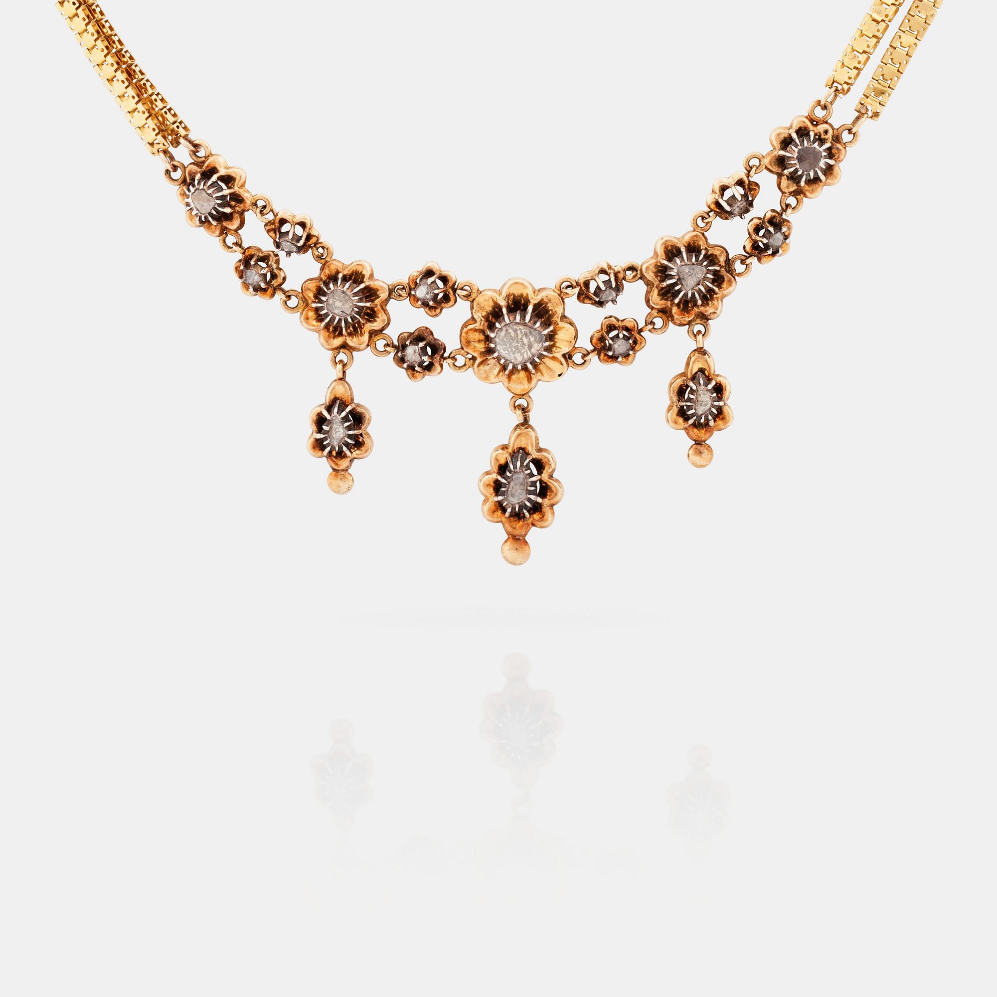A necklace set with rose-cut diamonds.
