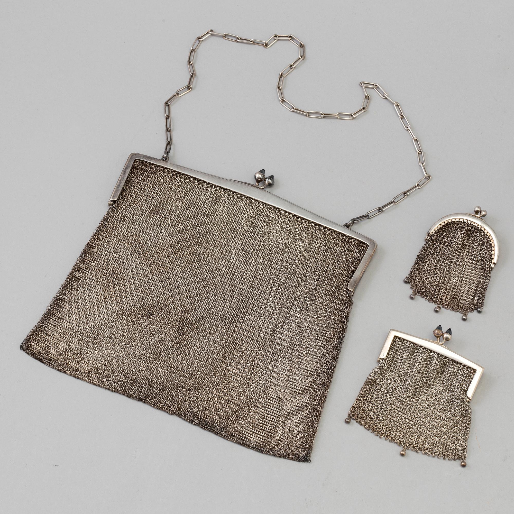 AFTONVÄSKA SAMT PORTMONNÄER, 3  stycken, silver, 1900-talets första hälft.
