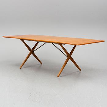 HANS J WEGNER, a teak and oak drop-leaf dining table, Andreas Tuck, Denmark 1950'-60's.