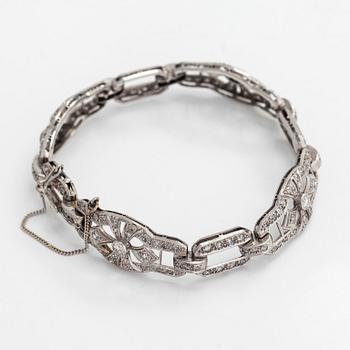 A platinum bracelet in Art deco style, with brilliant and eight-cut diamonds totalling approximately 2 ct.