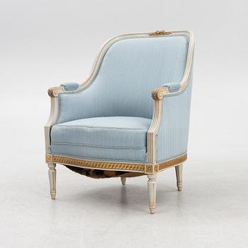 A Gustavian style armchair, first half of the 20th century.