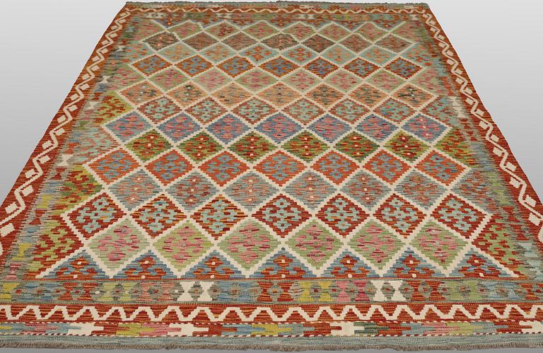 A Kilim carpet, approx. 297 x 205 cm.