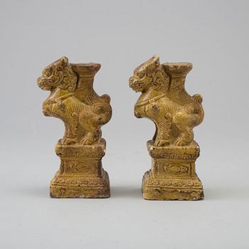 A pair of yellow glazed chinese joss sticks holders, 17th Century.