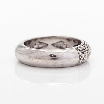 A 14K white gold ring with diamonds.