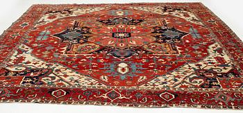 An antique Heriz Serapi carpet, north west persia, c 400-405 x 337 cm.