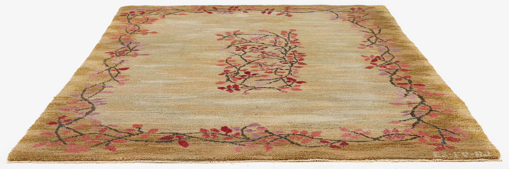 A knotted pile carpet, c. 275 x 177 cm, signed ES-FV-AJ.