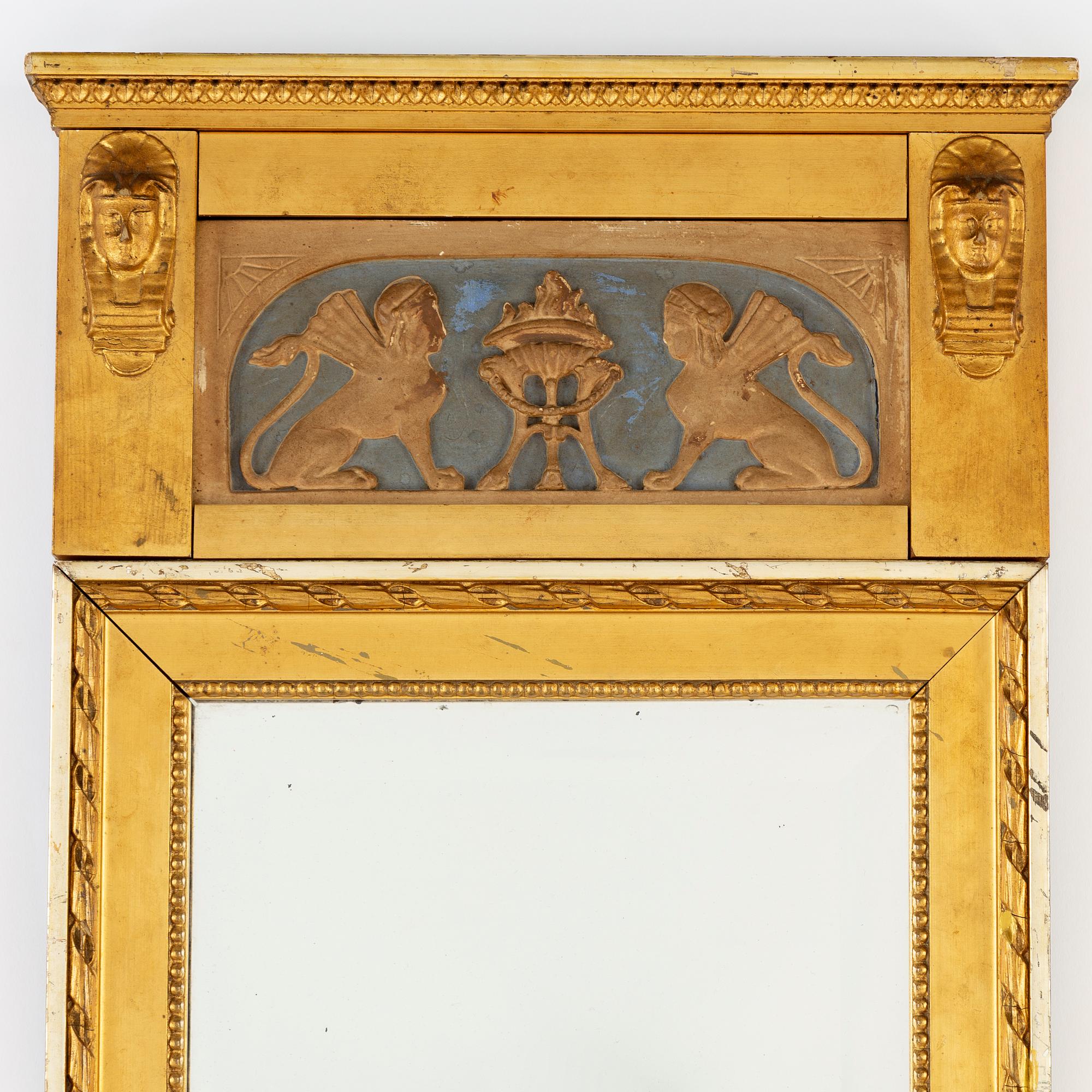 A late gustavian style mirror, ca 1900.