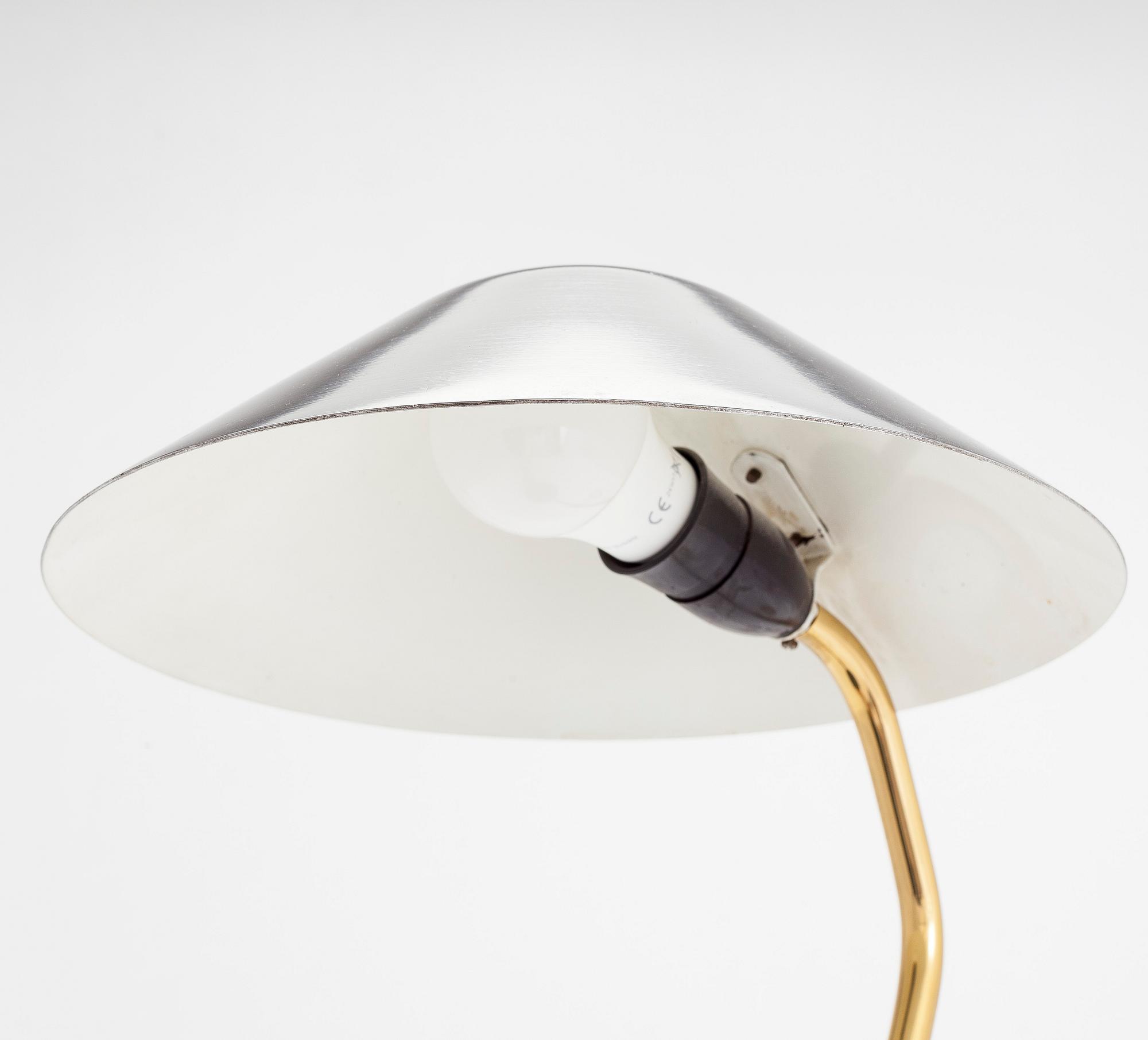 A mid 20th- century tamble lamp for Valinte.