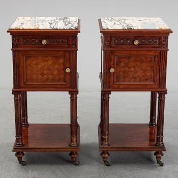 A pair of eclectic 20th century bedside tables.