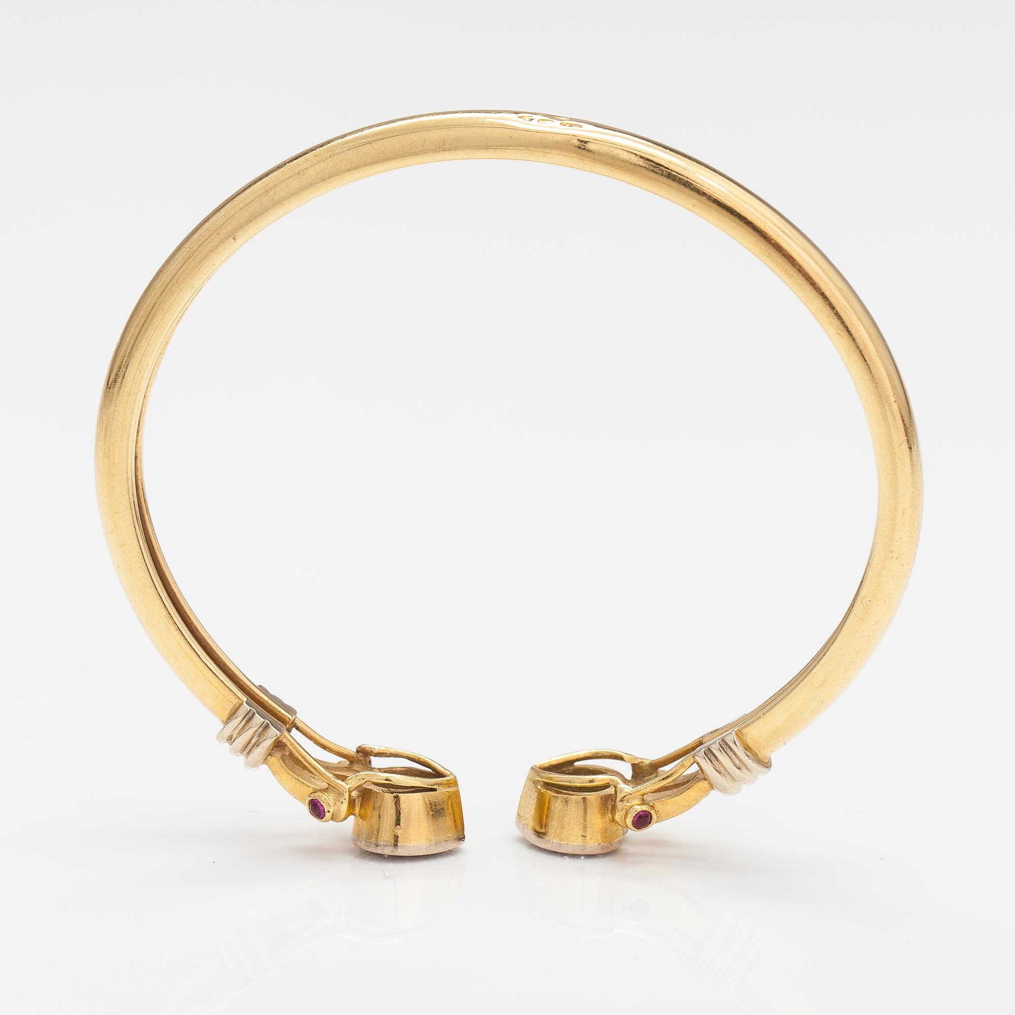 RANNEKORU, 14K kultaa, timantteja n. 0.24 ct yht ja rubiineja.