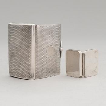 Three silver cigarette cases and a silver pillbox, marked in Finland and Germany, first half of the 20th Century.
