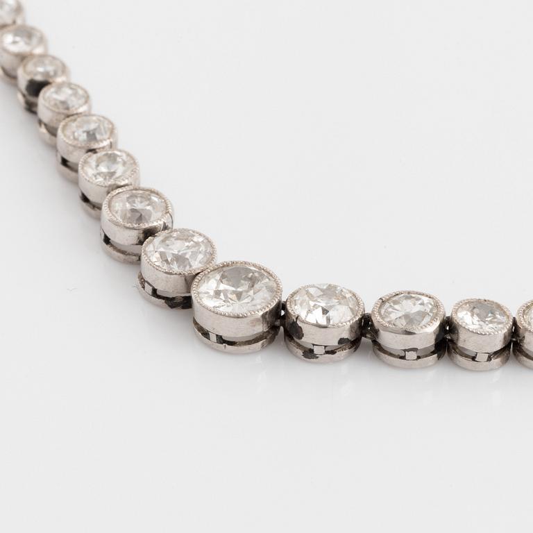 An 18K white gold and old-cut diamond rivière necklace.