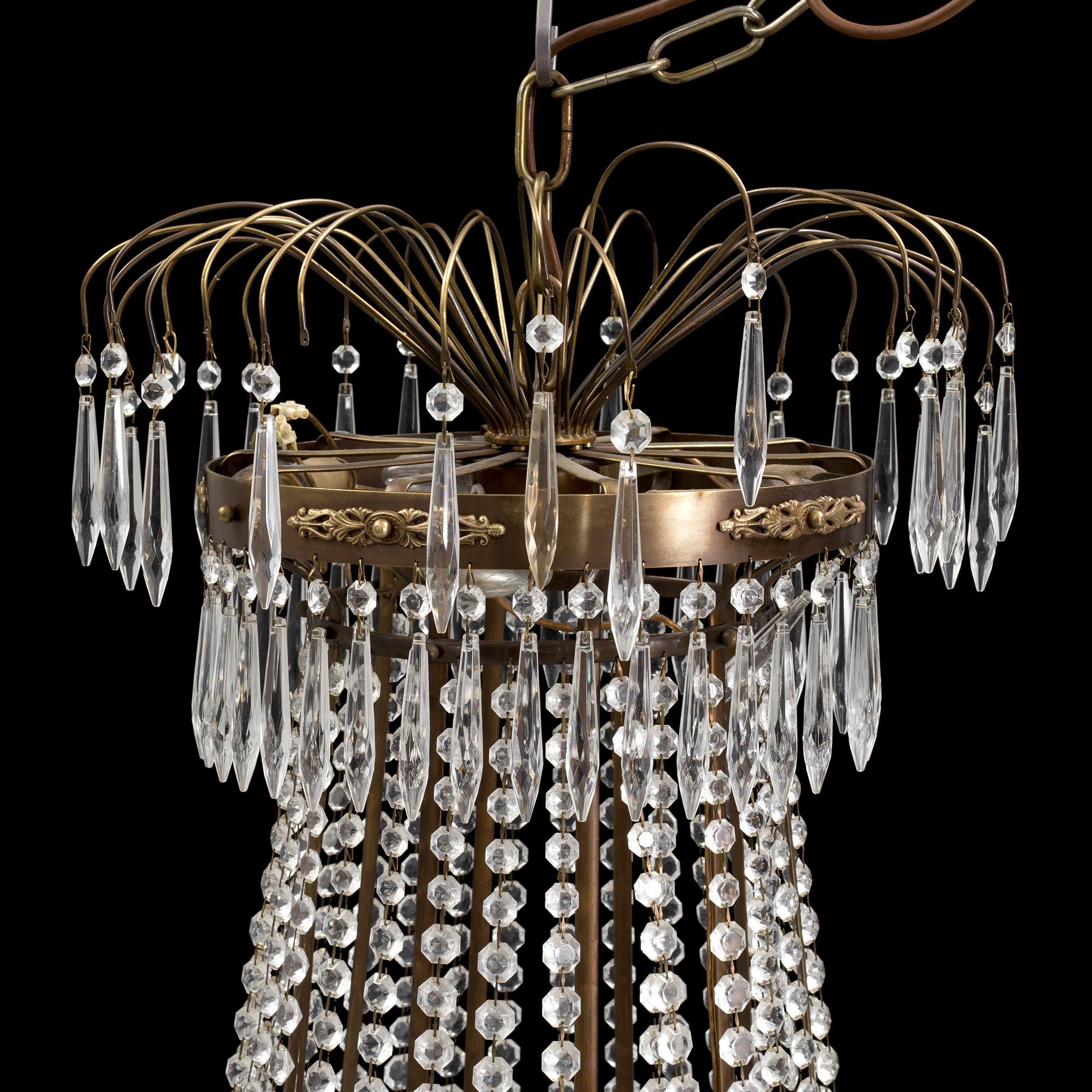 A CHANDELIER, Empire-style, second half of the 20th century.