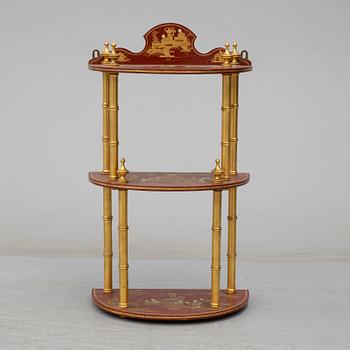 A Chinese lacquered shelf, 20th century.