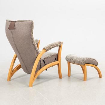 Armchair with footstool, "Focus", Bröderna Andersson, 21st century.