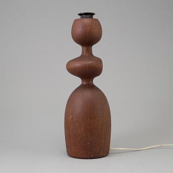 A 1960s teak table lamp.