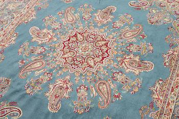 A Kirman carpet, c. 335 x 232 cm.