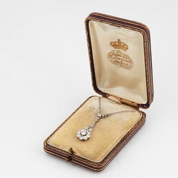 A platinum necklace set with old- and eight-cut diamonds.