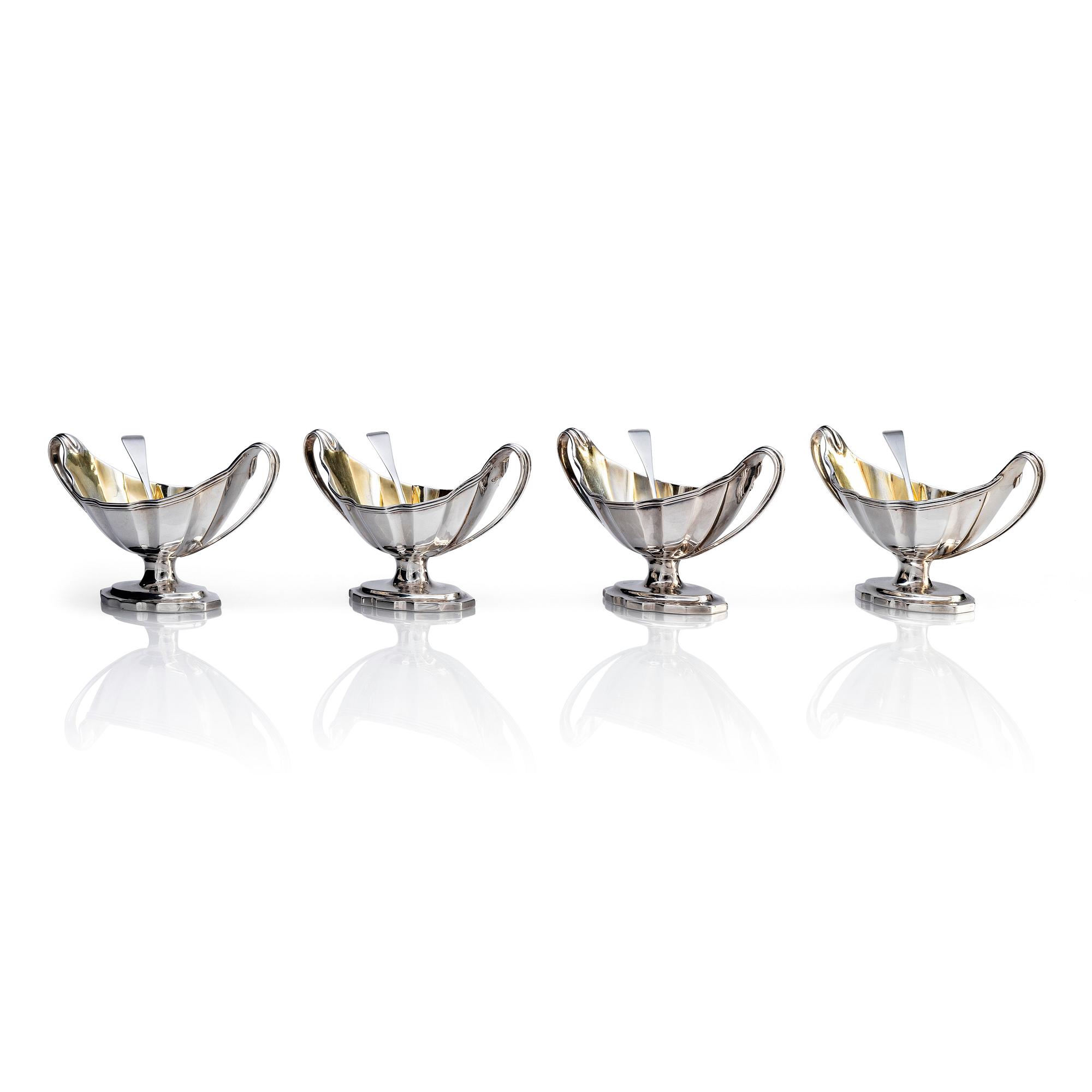 Four English 18th century silver salt-cellars, mark of William Fountain & Daniel Pontifax, London 1791, and spoons.