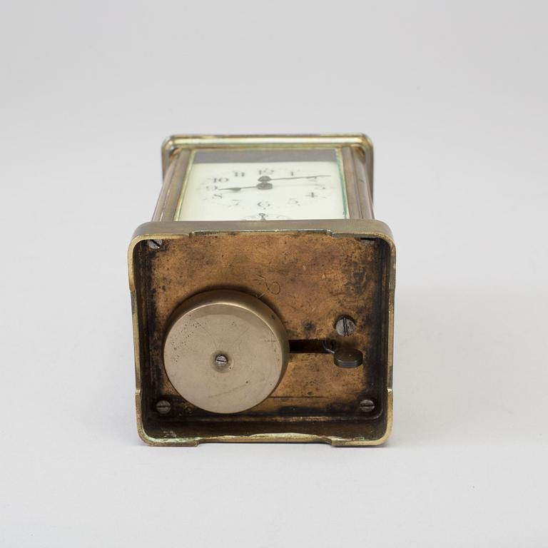 An early 20th century brass and glass carriage clock.