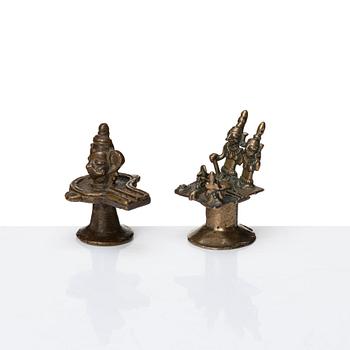 A group of eight brass miniatures, India, 19th/20th Century.