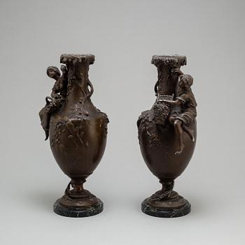 A pair of zinc and marble vases by Francois Moreau, France, ca 1900.