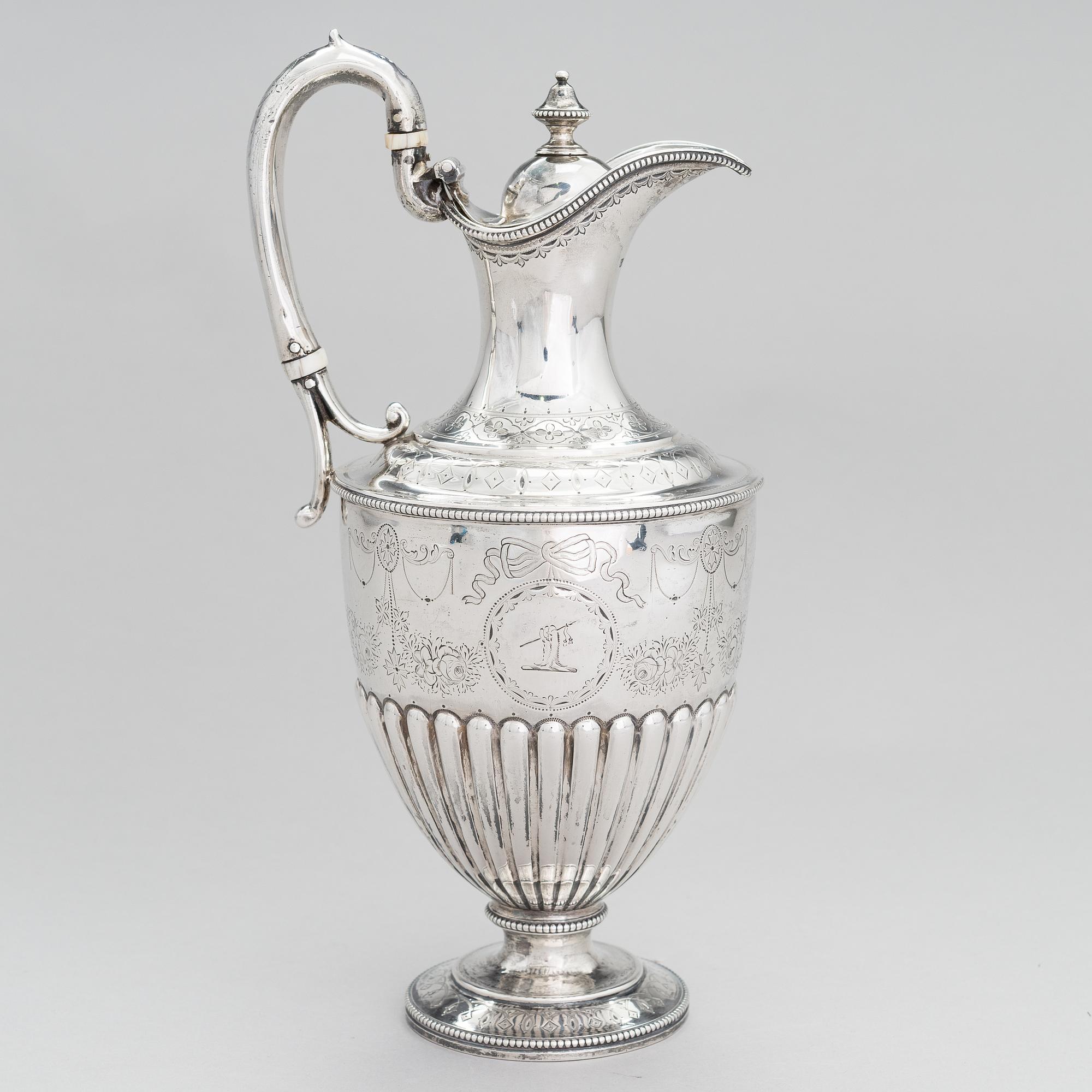 MARTIN, HALL & CO, A sterling silver pitcher, Sheffield 1873.
