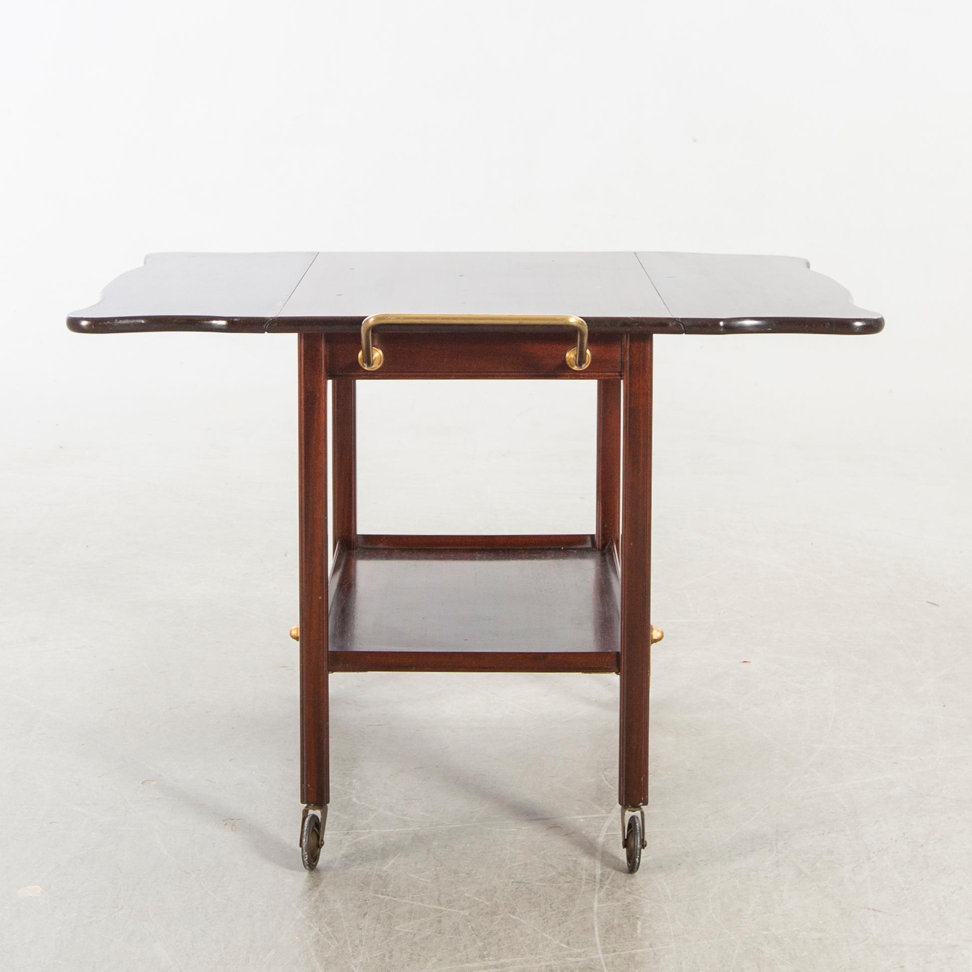 A mid 20th century tea trolly for Georg Kofoeds furniture, Denmark.