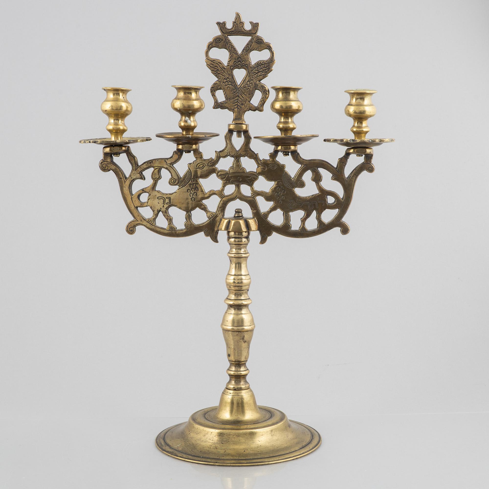 A brass Baroque style candelabra, 18th/19th century.