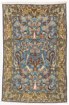 A Ghom figural rug, c. 202 x 132 cm.