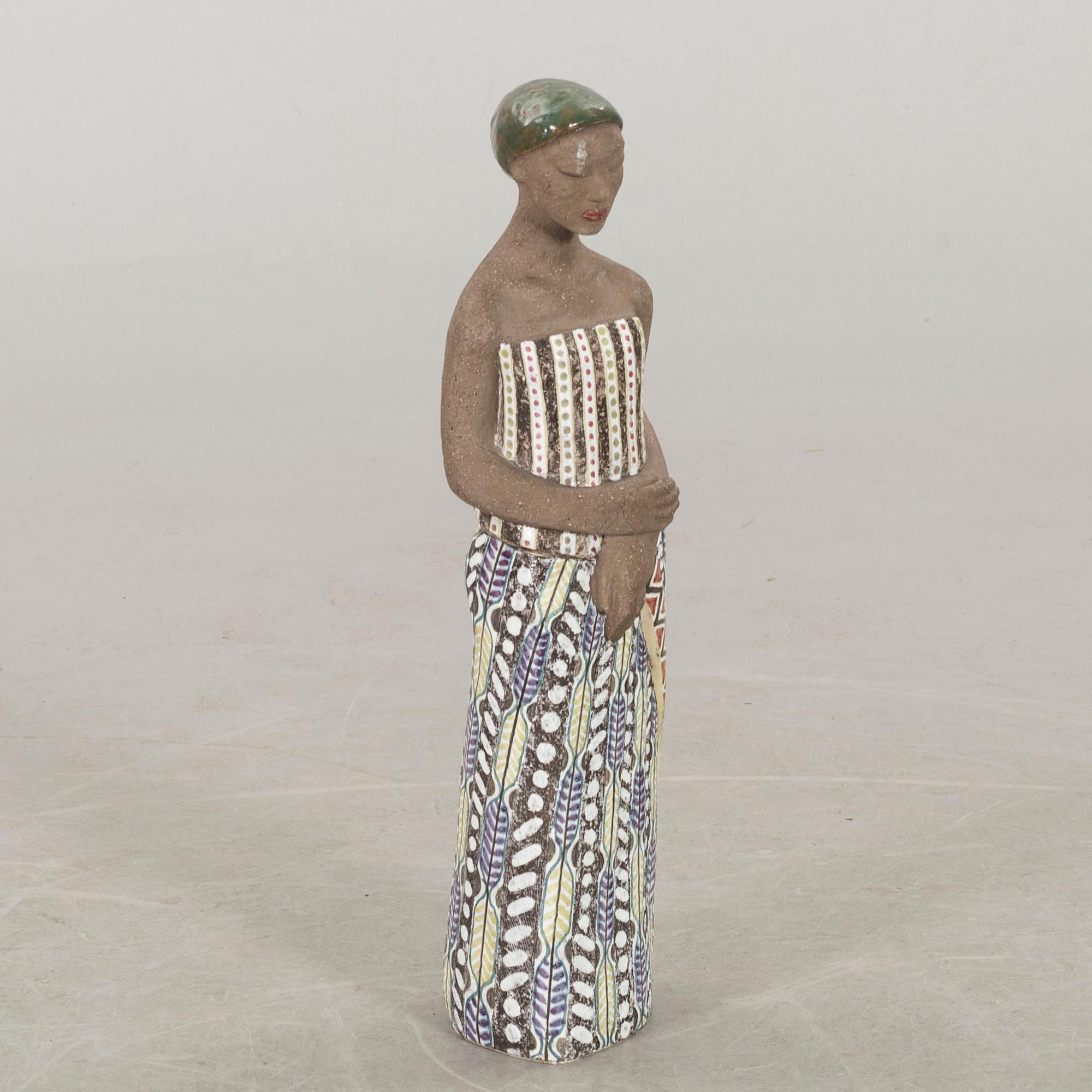 MARI SIMMULSON, a stoneware Upsala Ekeby signed figurine. 1953.