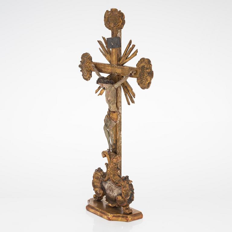 A 19th century gilded and painted wood crucifix.