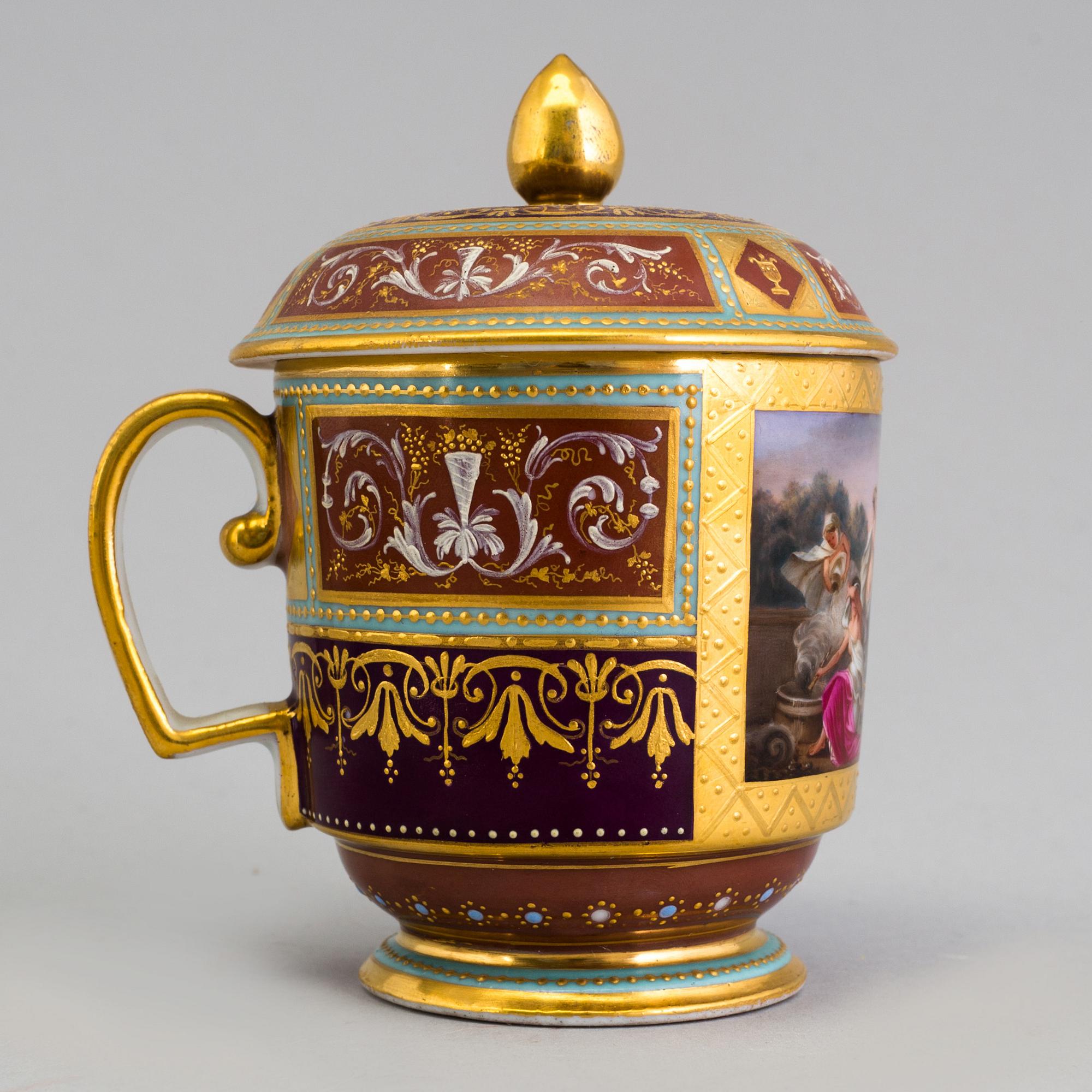 An early 19th century empire cup with saucer and cover with Wien mark.