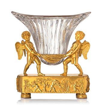 121. An Empire gilded bronze and glass centre piece, first part of the 19th century.