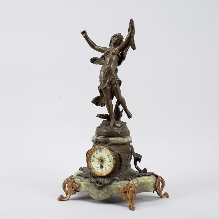 A bronze, green stone table clock, 'La Merveilleuse', after Auguste Moreau, 20th century.