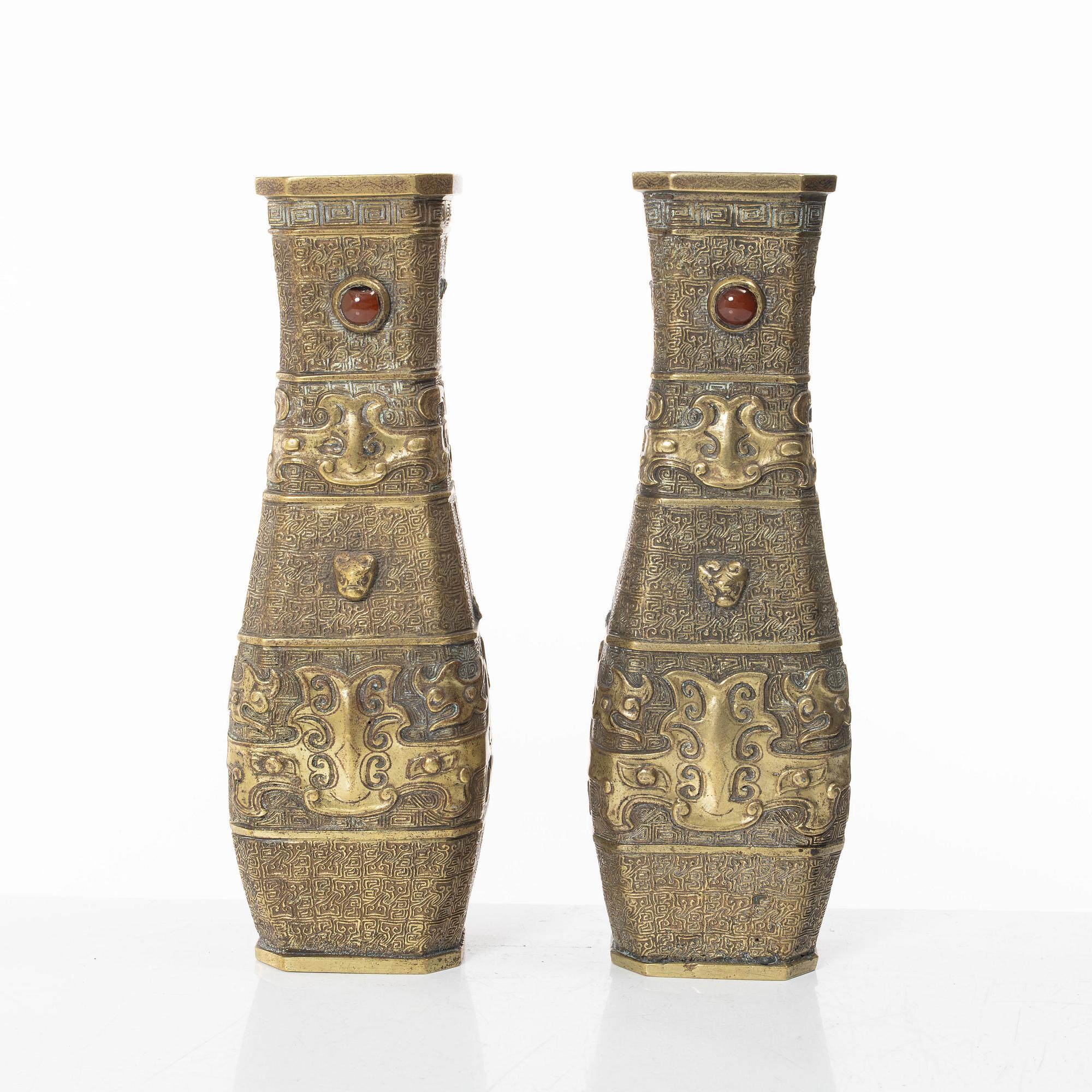 A pair of Chinese gilt bronze vases, Qing dynasty (1644-1912).