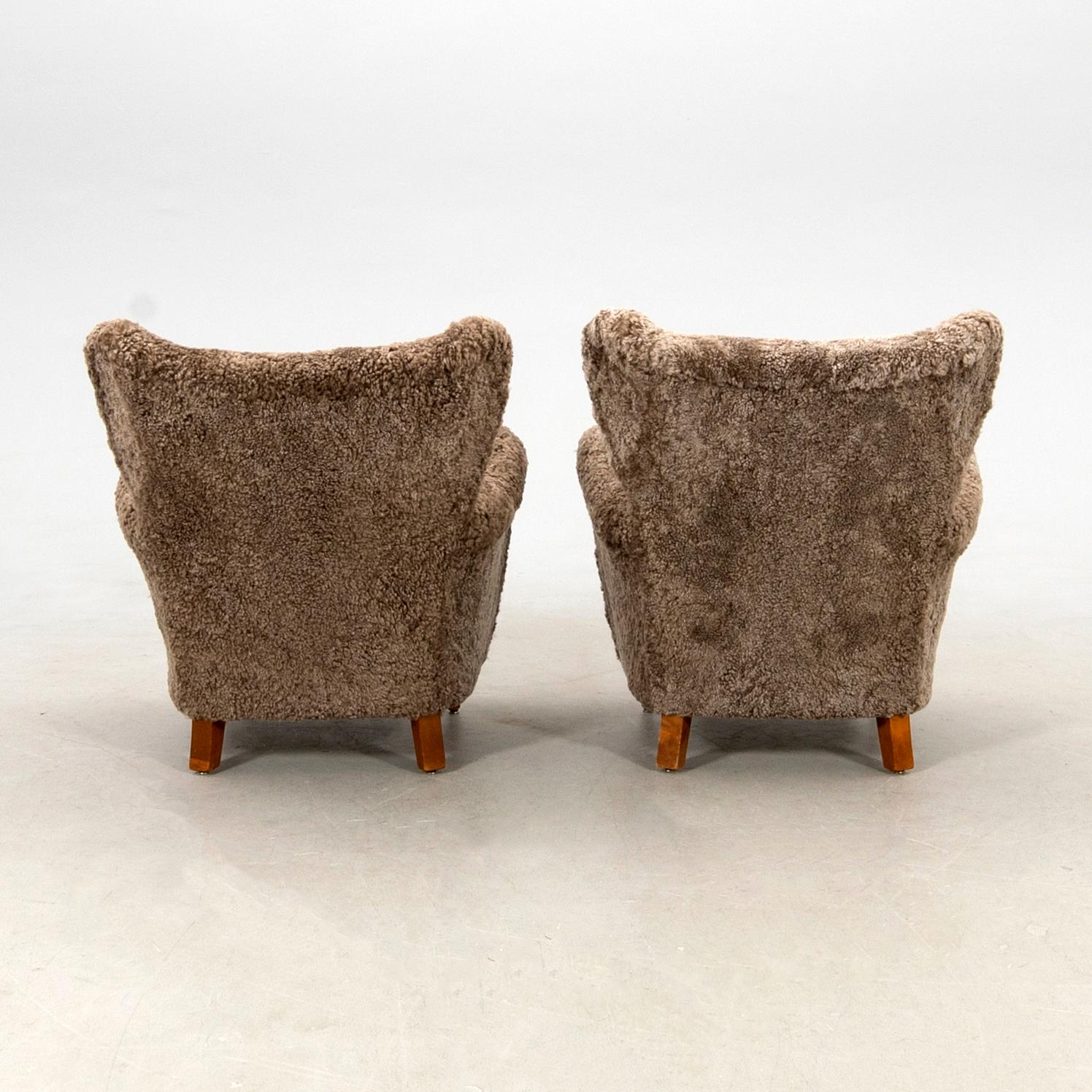 Armchairs, a pair from the 1940s.
