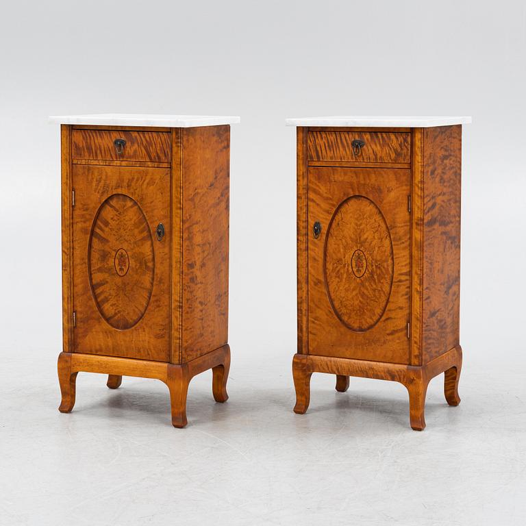 A pair of bedside tables, early 20th century.