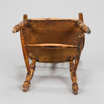 An armchair in Windsor style, 18th century.