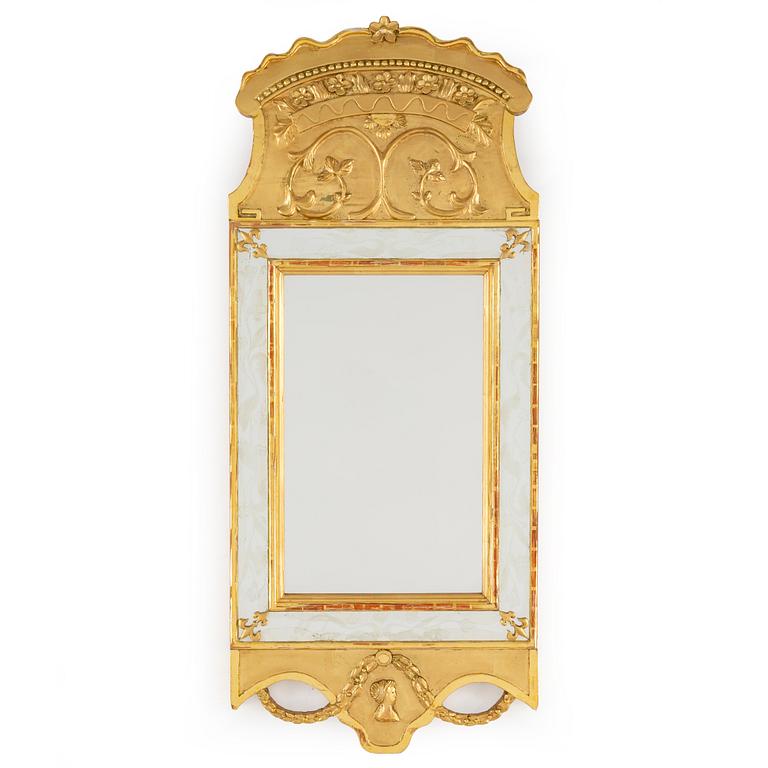 An empire style mirror, 20th century.