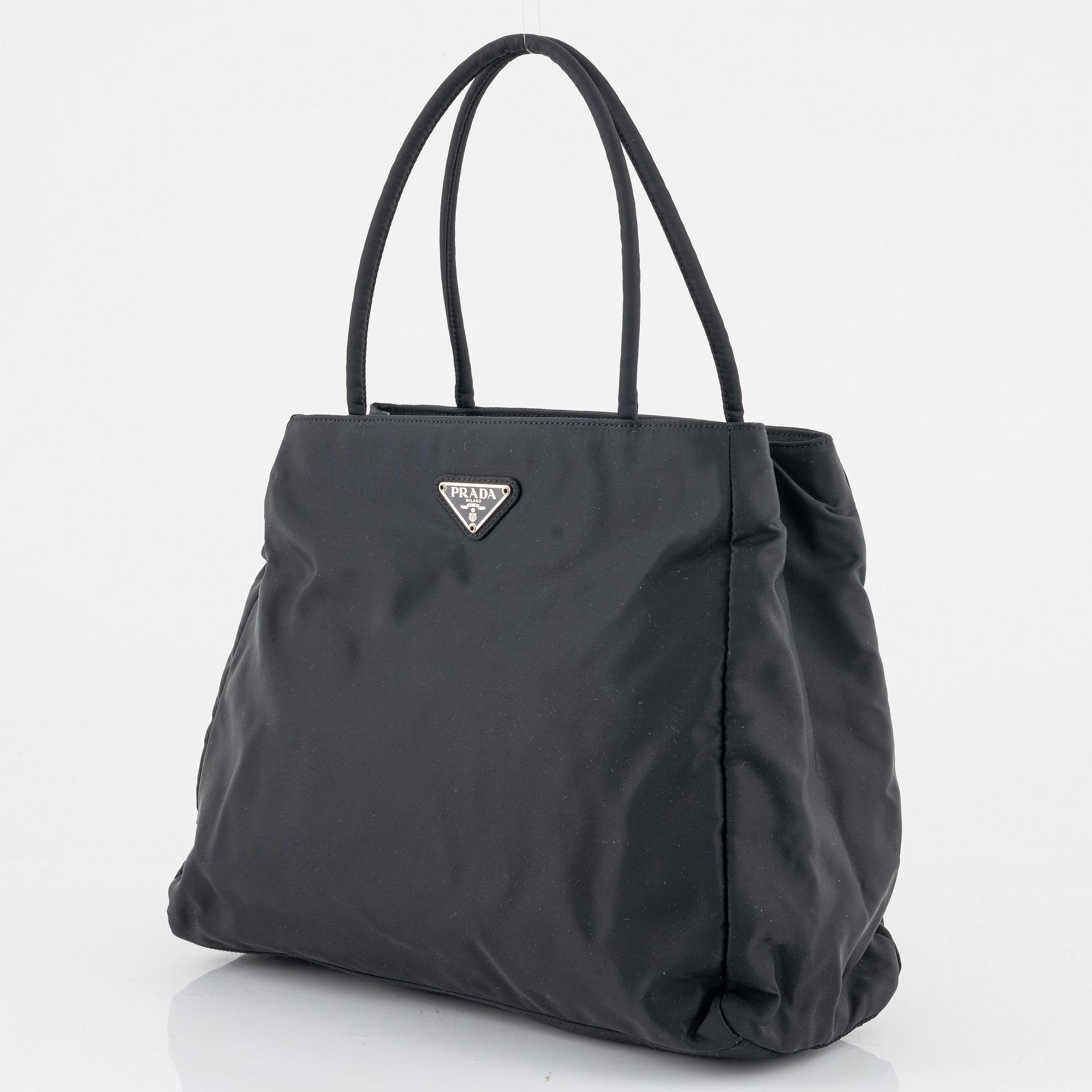 Prada, a black nylon handbag.