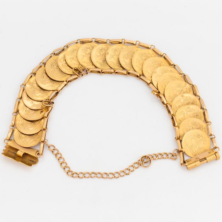 BRACELET, 21 K gold, consisting of British sovereigns, George V 1911.