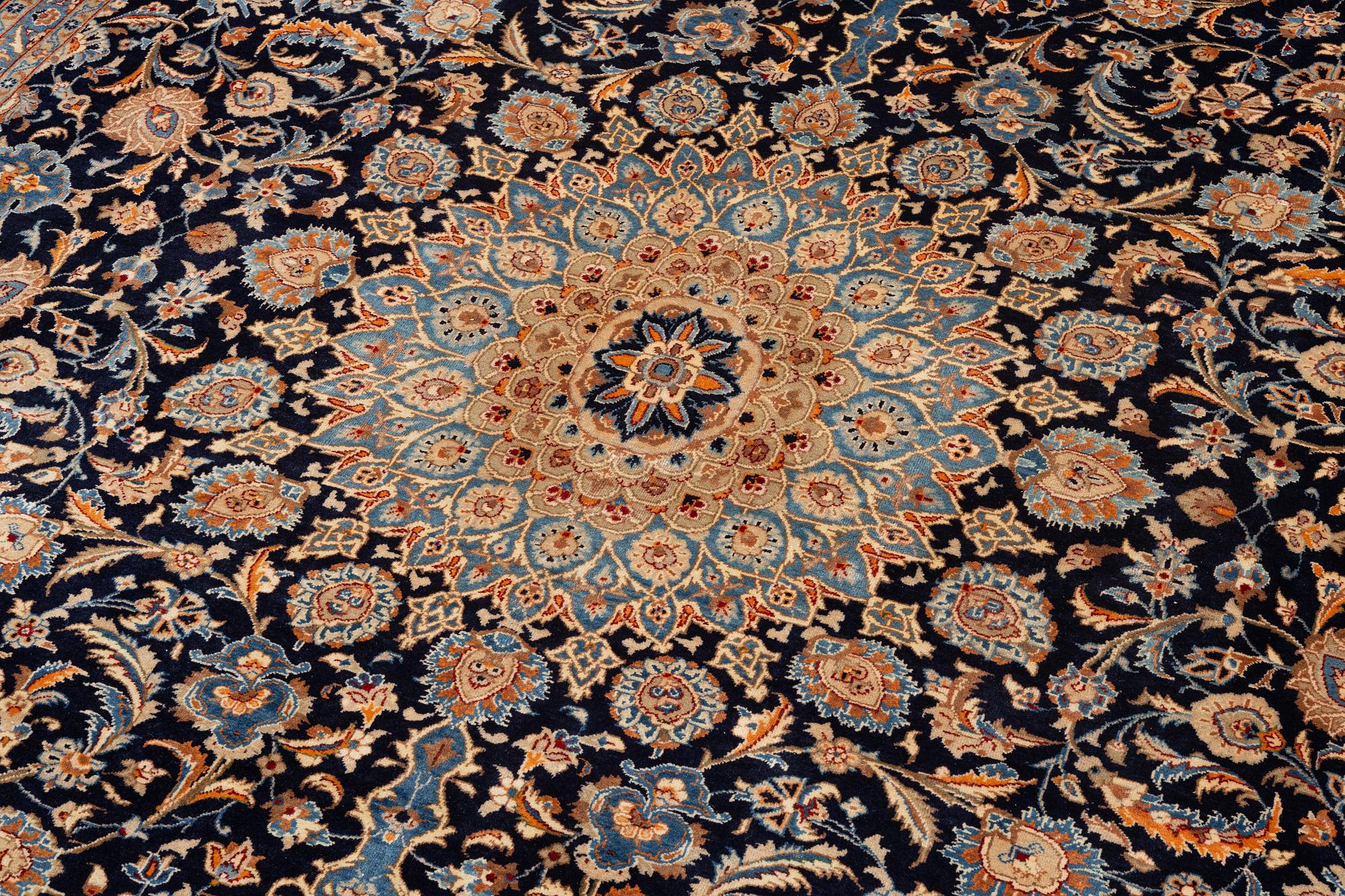 A Keshan rug, approx. 370 x 297 cm.