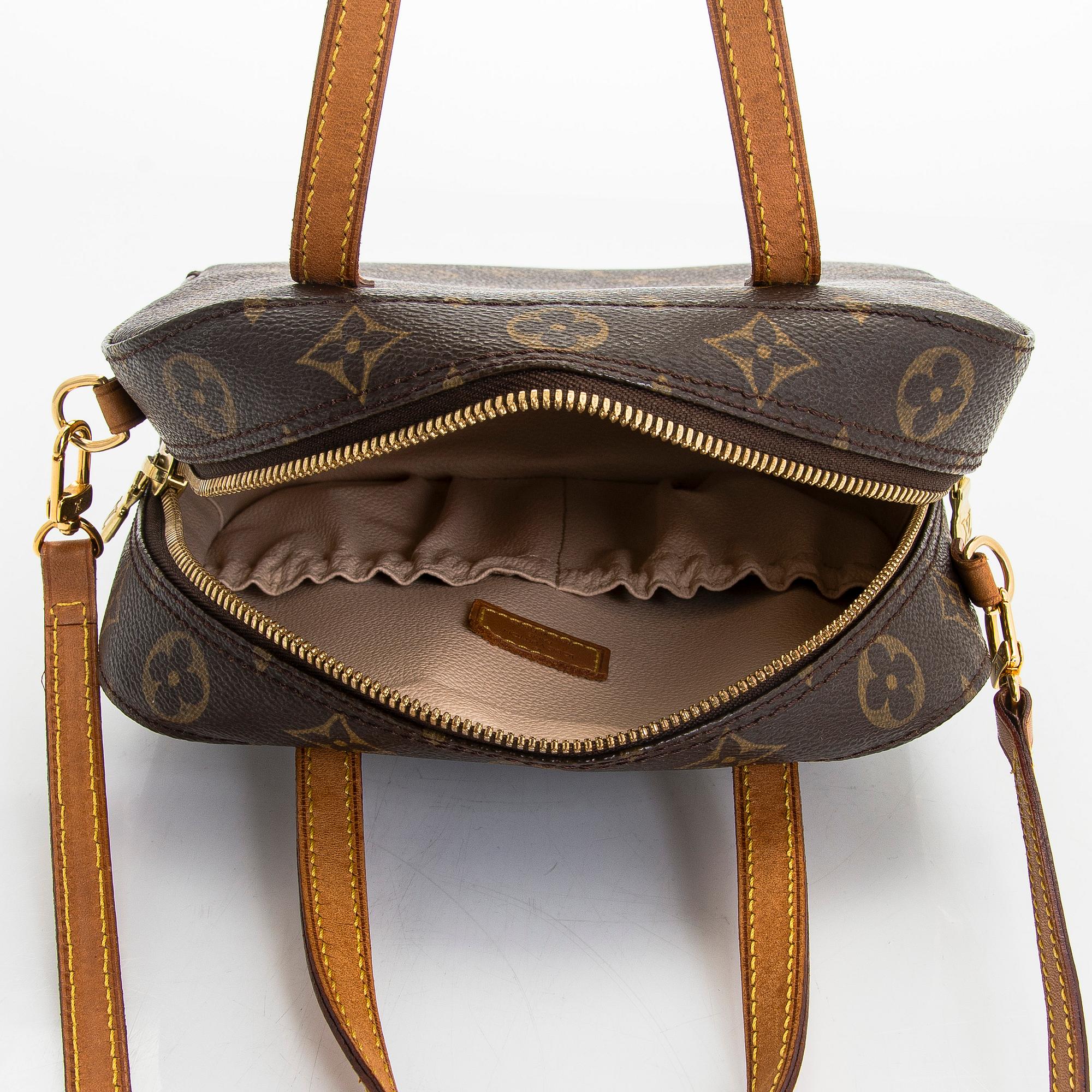 Louis Vuitton, a Monogram Canvas 'Spontini' bag.