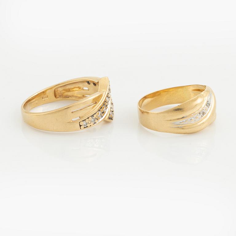 18K gold and diamond rings.