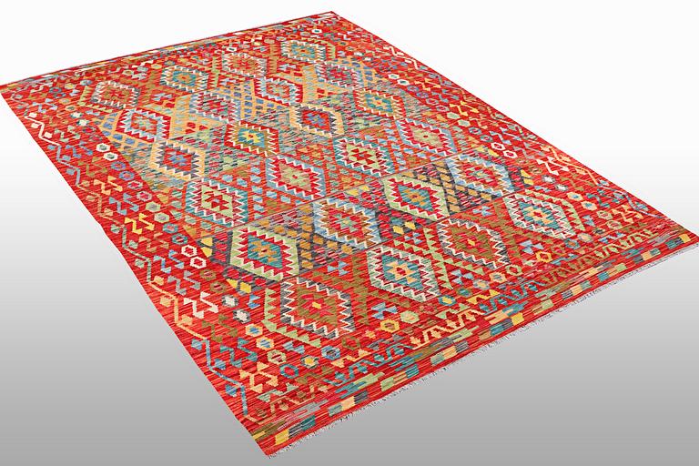 A carpet, kilim, ca 297 x 202 cm.