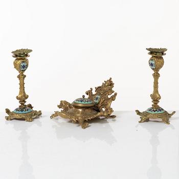 A pair candlesticks and an inkwell, circa 1900.